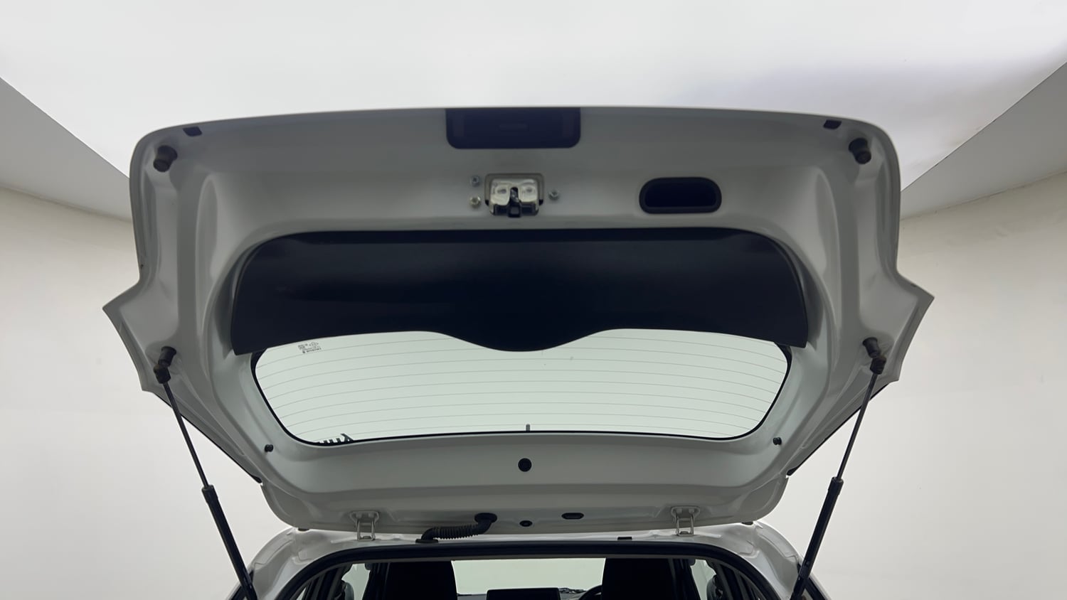 Used 2026 Maruti Suzuki Swift LXi Petrol Manual interior DICKY DOOR OPEN VIEW
