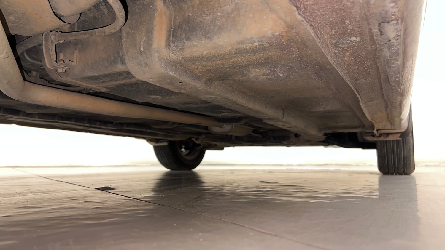Used 2015 Hyundai Grand i10 Asta 1.1 CRDi (O) Diesel Manual extra REAR RIGHT UNDERBODY VIEW