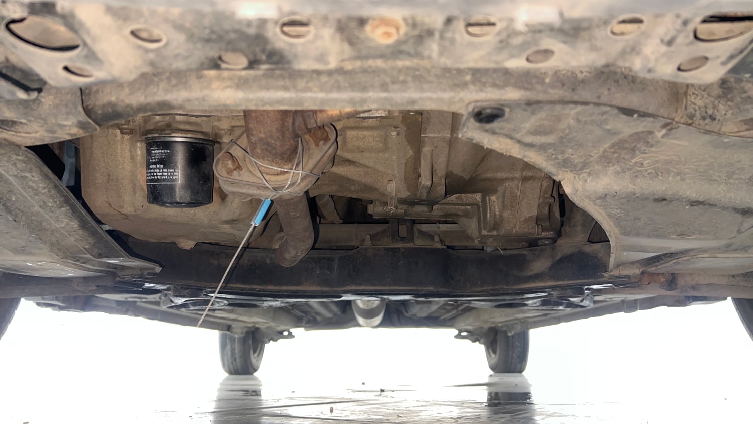 Used 2014 Maruti Suzuki Swift LXi Petrol Manual extra FRONT LEFT UNDERBODY VIEW