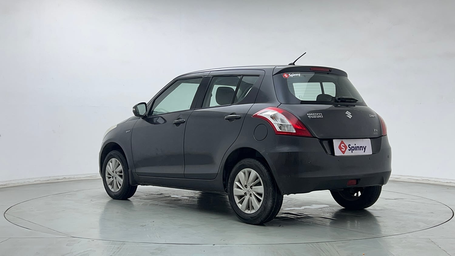 Used 2015 Maruti Suzuki Swift ZXi Petrol Manual exterior LEFT REAR CORNER VIEW