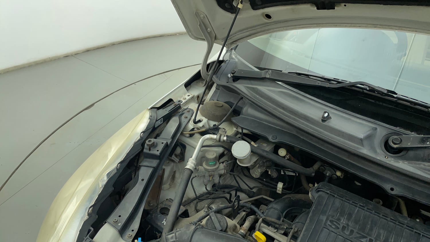 Used 2012 Maruti Suzuki Swift Dzire VXI Petrol Manual engine ENGINE RIGHT SIDE HINGE & APRON VIEW
