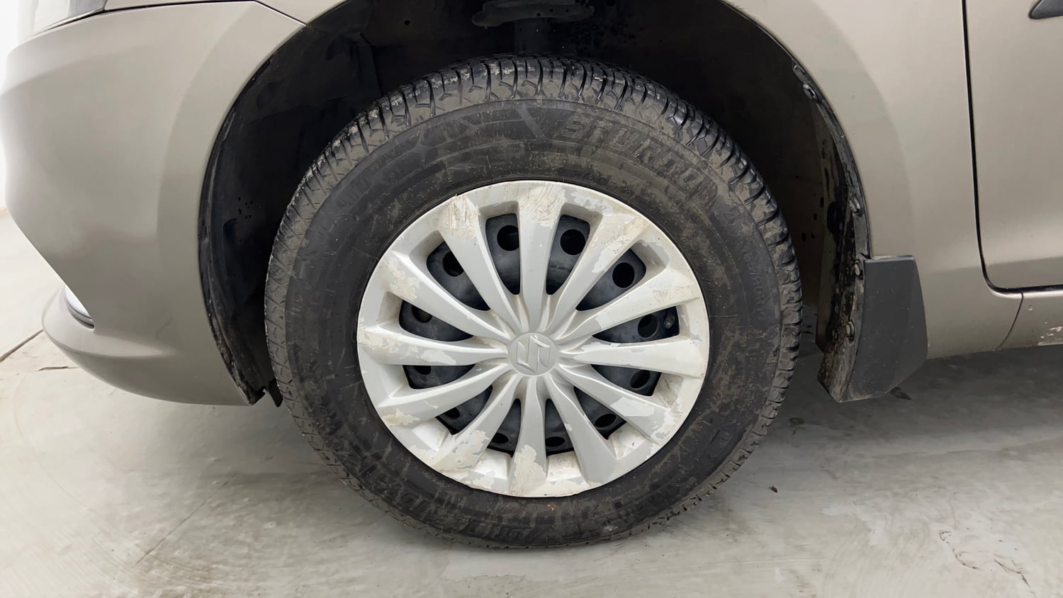Used 2016 Maruti Suzuki Swift Dzire VXI Petrol Manual tyres LEFT FRONT TYRE RIM VIEW