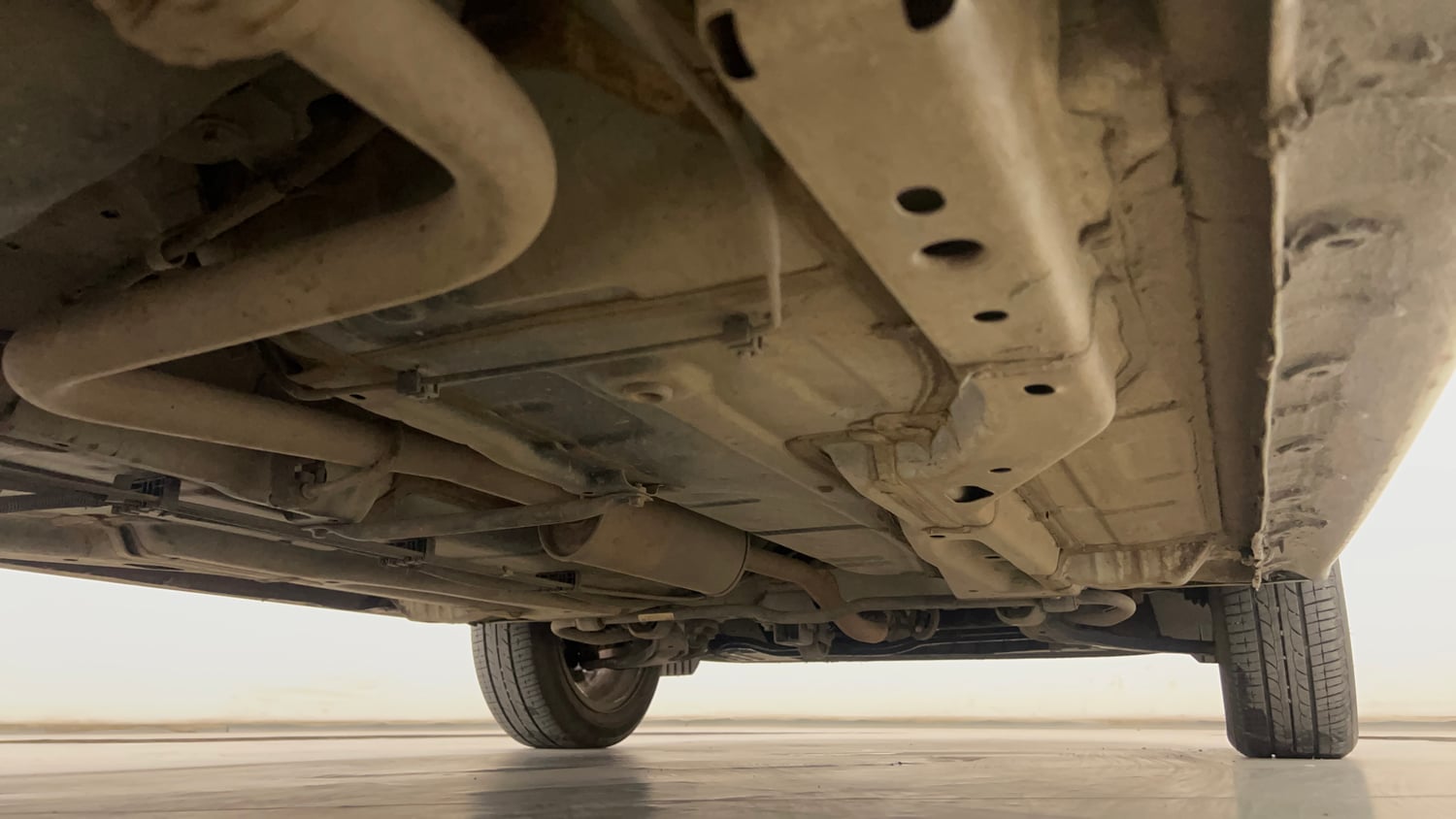 Used 2024 Tata Tigor XZ Plus Petrol Manual extra REAR RIGHT UNDERBODY VIEW