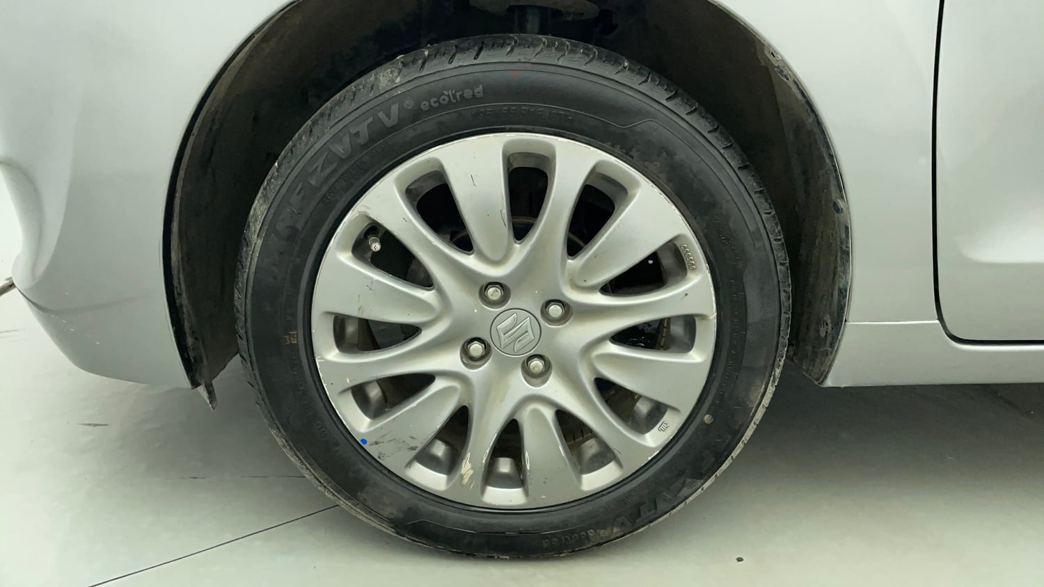 Used 2018 Maruti Suzuki Baleno Zeta 1.2 Petrol Manual tyres LEFT FRONT TYRE RIM VIEW