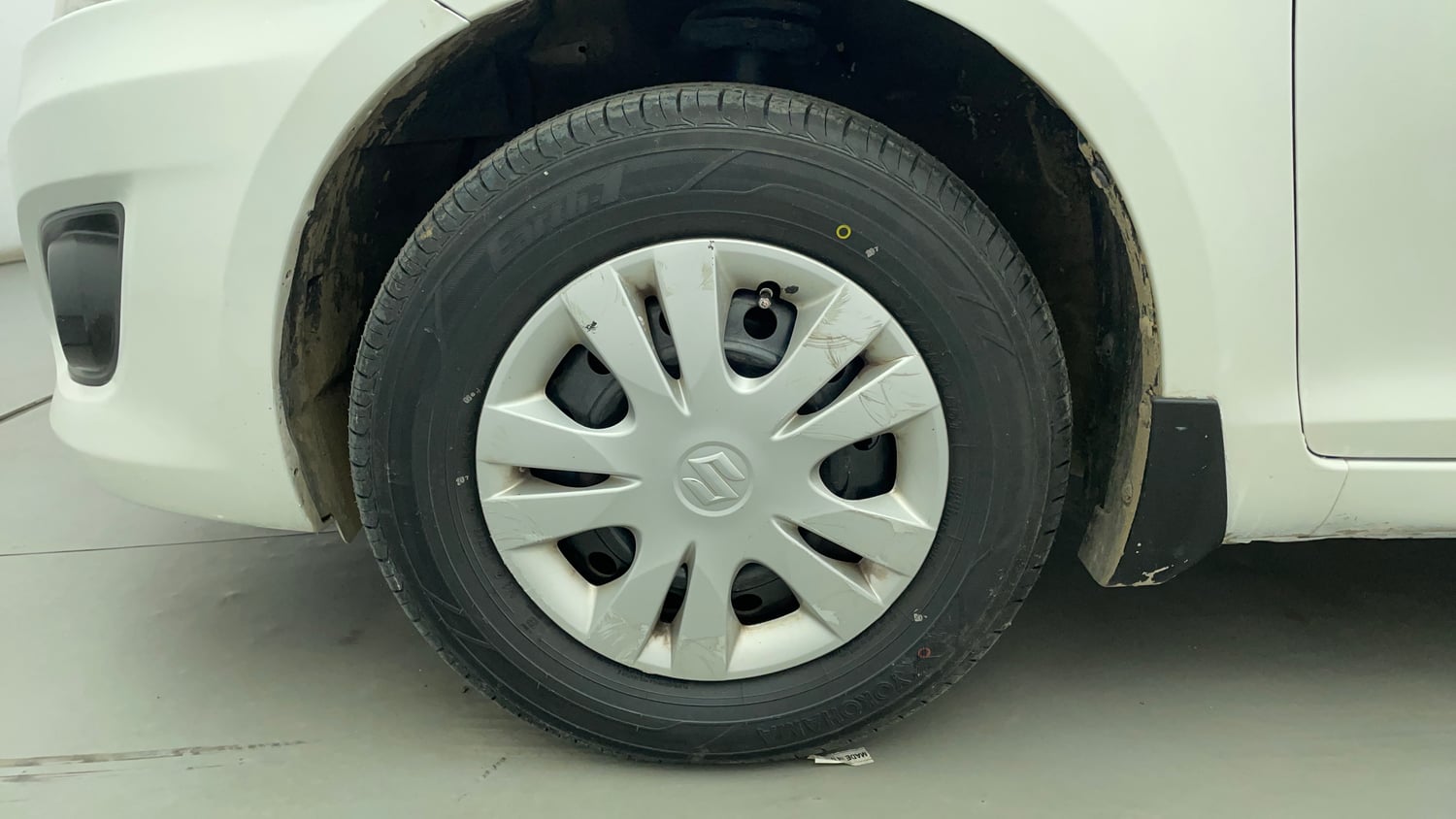 Used 2012 Maruti Suzuki Swift Dzire VXI Petrol Manual tyres LEFT FRONT TYRE RIM VIEW