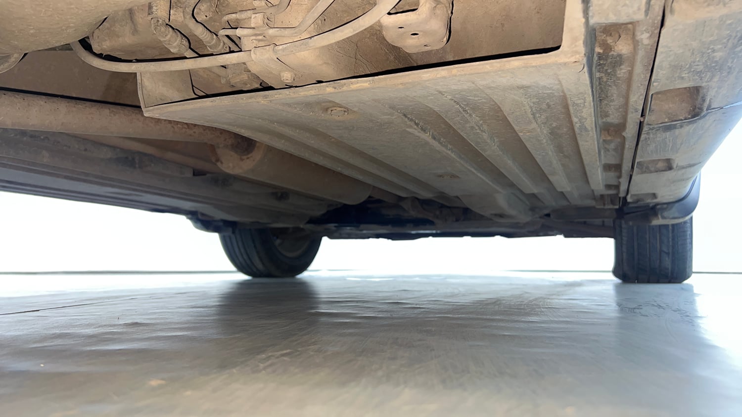 Used 2021 Maruti Suzuki Vitara Brezza ZXi AT SHVS Petrol Automatic extra REAR RIGHT UNDERBODY VIEW