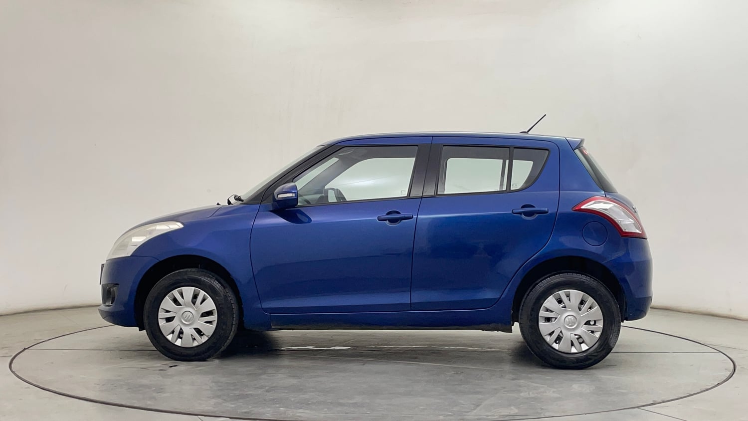 Used 2014 Maruti Suzuki Swift VXi Petrol Manual exterior LEFT SIDE VIEW