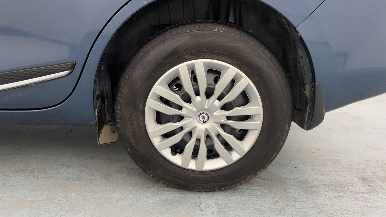Used 2026 Maruti Suzuki Dzire VXi AMT Petrol Automatic tyres LEFT REAR TYRE RIM VIEW