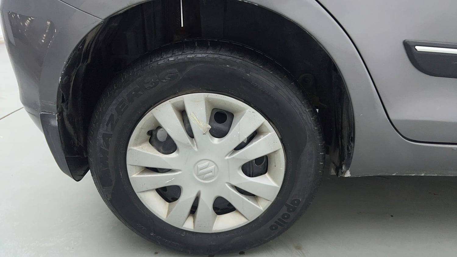 Used 2014 Maruti Suzuki Swift LXi Petrol Manual tyres RIGHT REAR TYRE RIM VIEW
