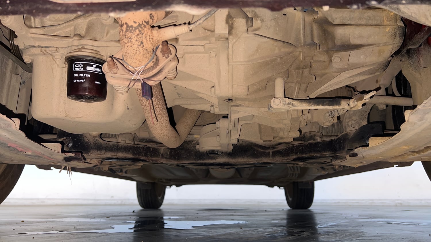 Used 2016 Maruti Suzuki Baleno Zeta 1.2 Petrol Manual extra FRONT LEFT UNDERBODY VIEW