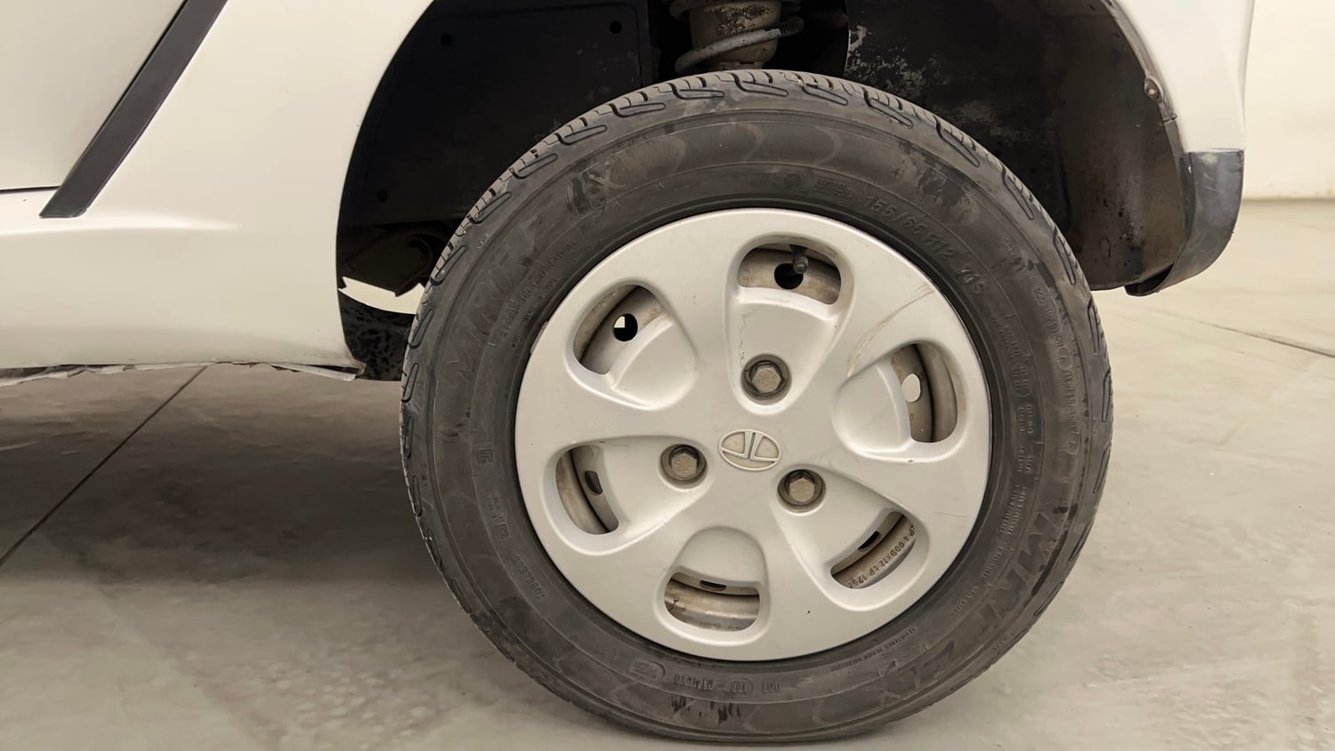 Used 2015 Tata Nano Twist XT Petrol Manual tyres LEFT REAR TYRE RIM VIEW