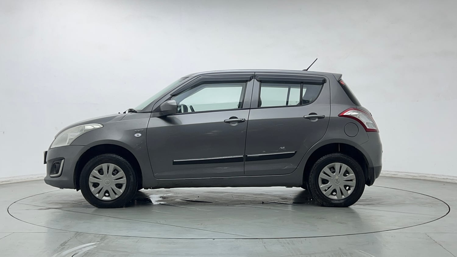 Used 2014 Maruti Suzuki Swift LXi Petrol Manual exterior LEFT SIDE VIEW