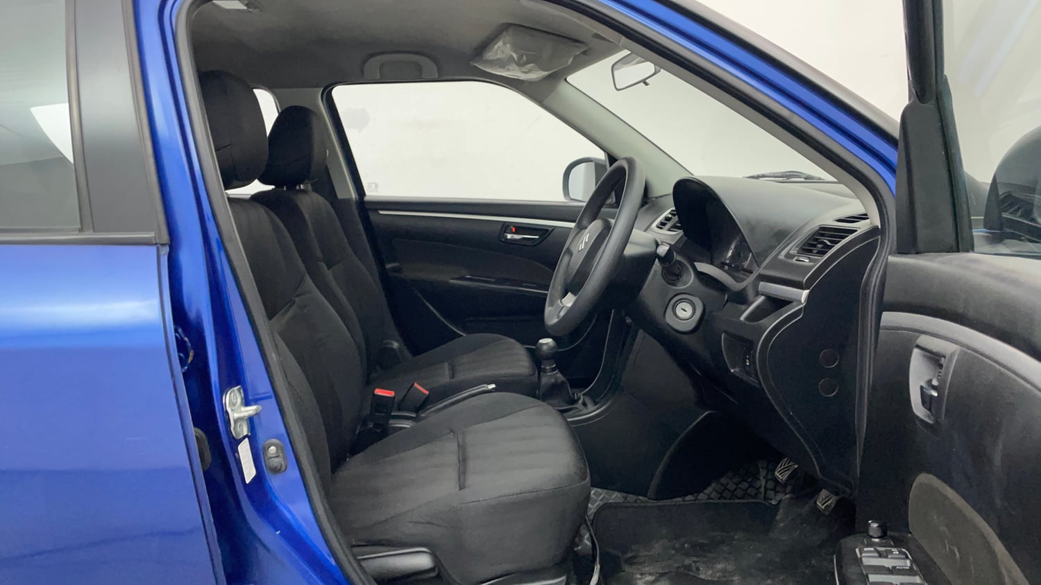Used 2014 Maruti Suzuki Swift VXi Petrol Manual interior RIGHT SIDE FRONT DOOR CABIN VIEW