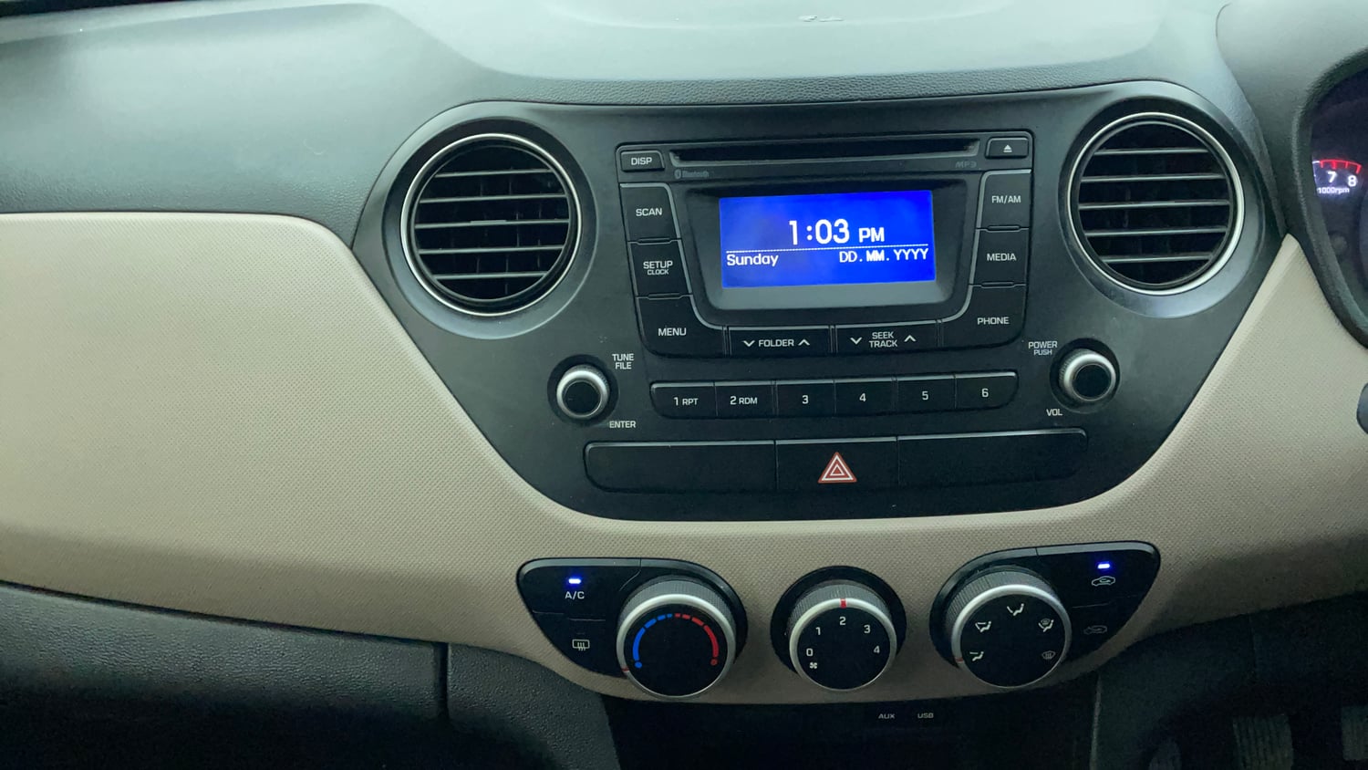 Used 2015 Hyundai Grand i10 Sportz 1.2 Kappa VTVT Petrol Manual interior MUSIC SYSTEM & AC CONTROL VIEW