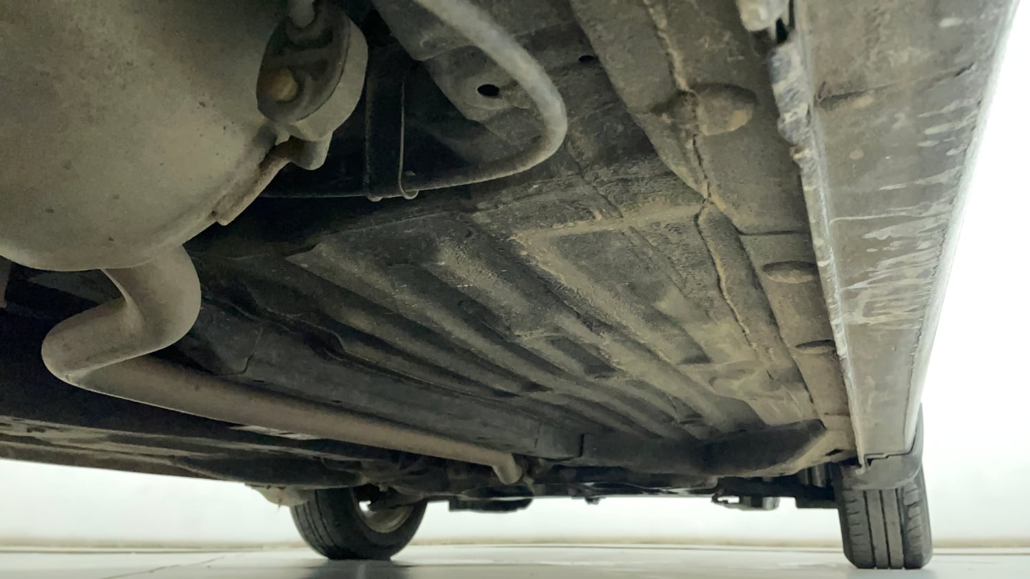 Used 2023 Honda Amaze VX MT 1.2 Petrol Petrol Manual extra REAR RIGHT UNDERBODY VIEW