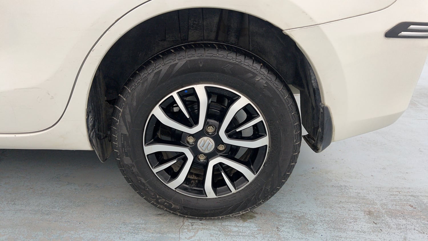 Used 2022 Maruti Suzuki Dzire VXi AGS Petrol Automatic tyres LEFT REAR TYRE RIM VIEW