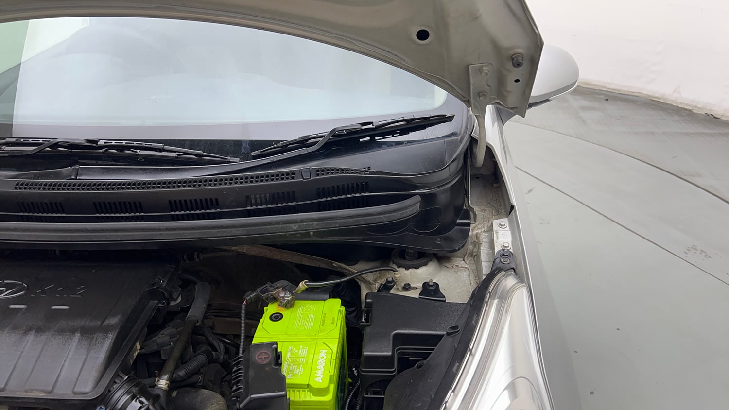 Used 2018 Hyundai Grand i10 Sportz (O) 1.2 Kappa VTVT Petrol Manual engine ENGINE LEFT SIDE HINGE & APRON VIEW