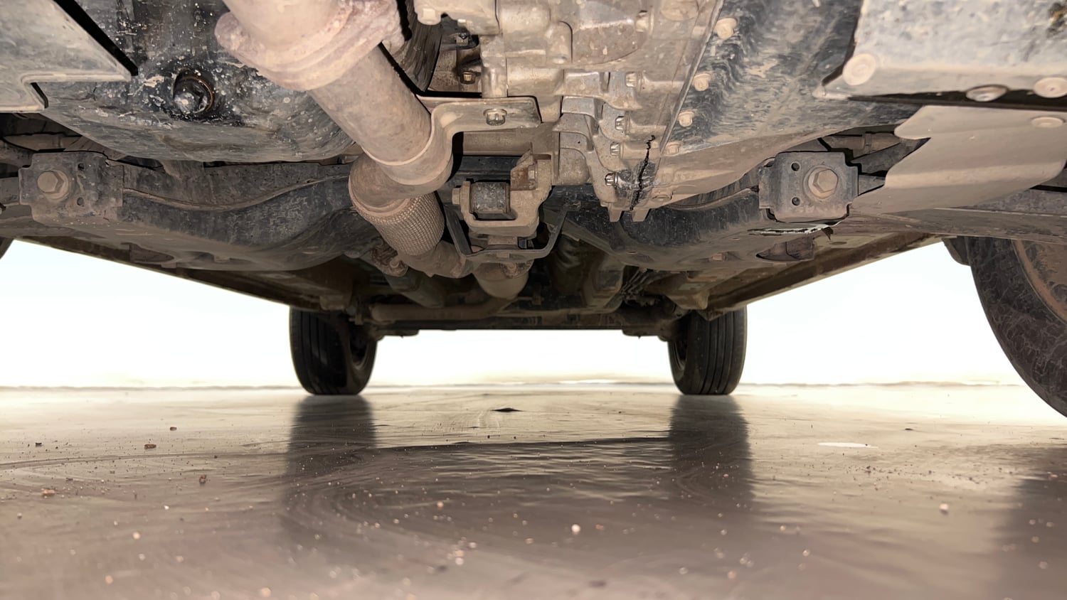 Used 2024 Tata Nexon Creative Plus S 1.2 Revotron Petrol 7DCA Petrol Automatic extra FRONT LEFT UNDERBODY VIEW