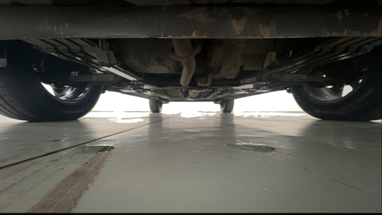 Used 2023 Tata Punch Creative Dual Tone AMT Petrol Automatic extra FRONT LEFT UNDERBODY VIEW