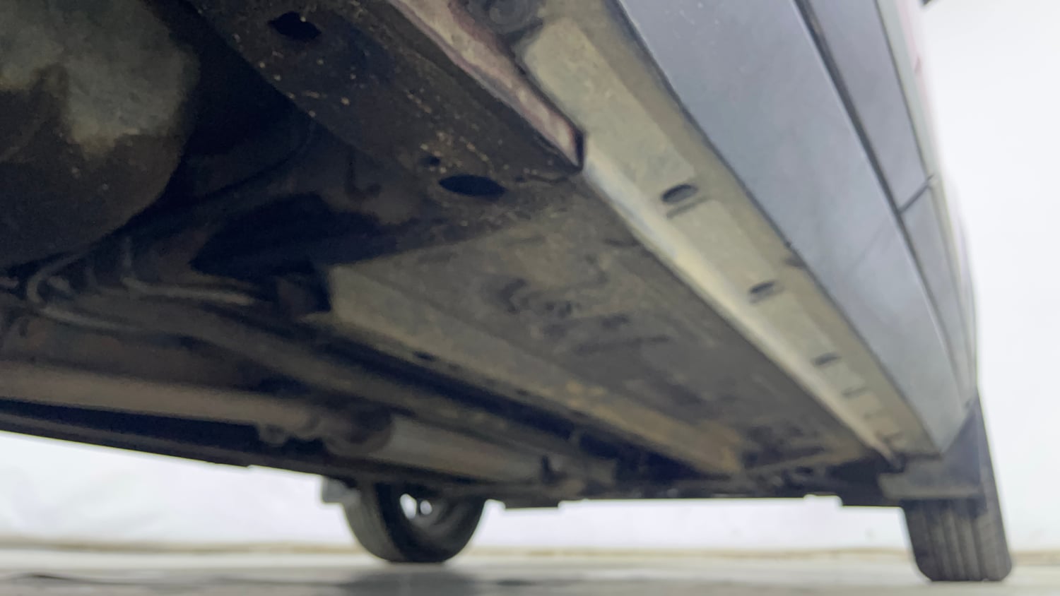 Used 2023 Nissan Magnite XV Turbo CVT Petrol Automatic extra REAR RIGHT UNDERBODY VIEW