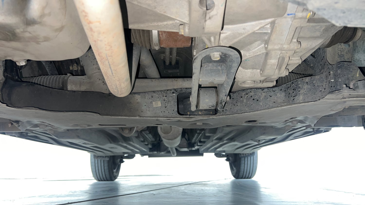 Used 2024 Maruti Suzuki Brezza LXi S-CNG Cng Manual extra FRONT LEFT UNDERBODY VIEW