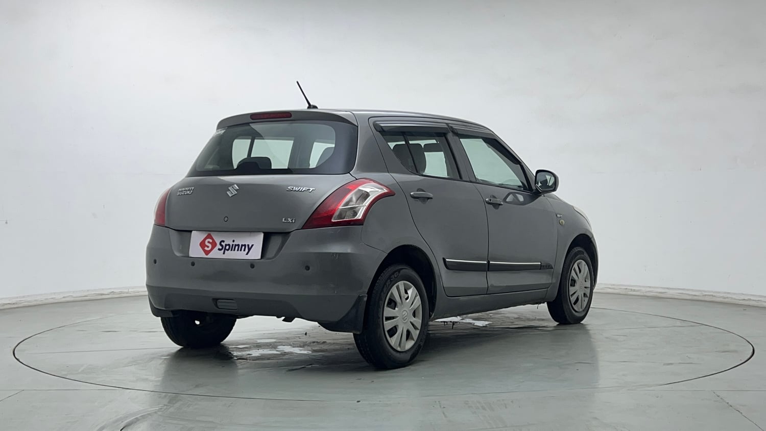 Used 2014 Maruti Suzuki Swift LXi Petrol Manual exterior RIGHT REAR CORNER VIEW