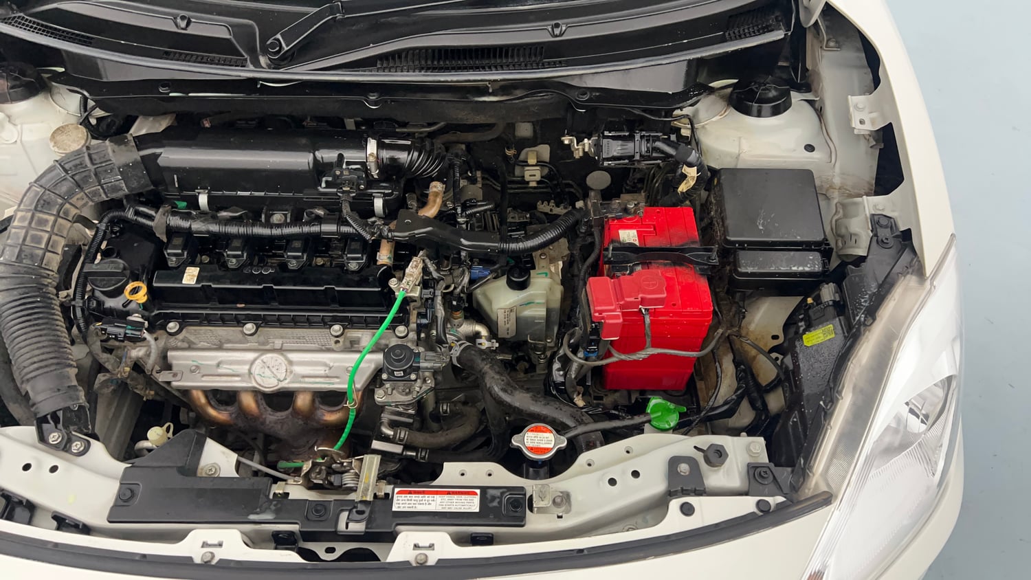 Used 2022 Maruti Suzuki Dzire VXi AGS Petrol Automatic engine ENGINE LEFT SIDE VIEW