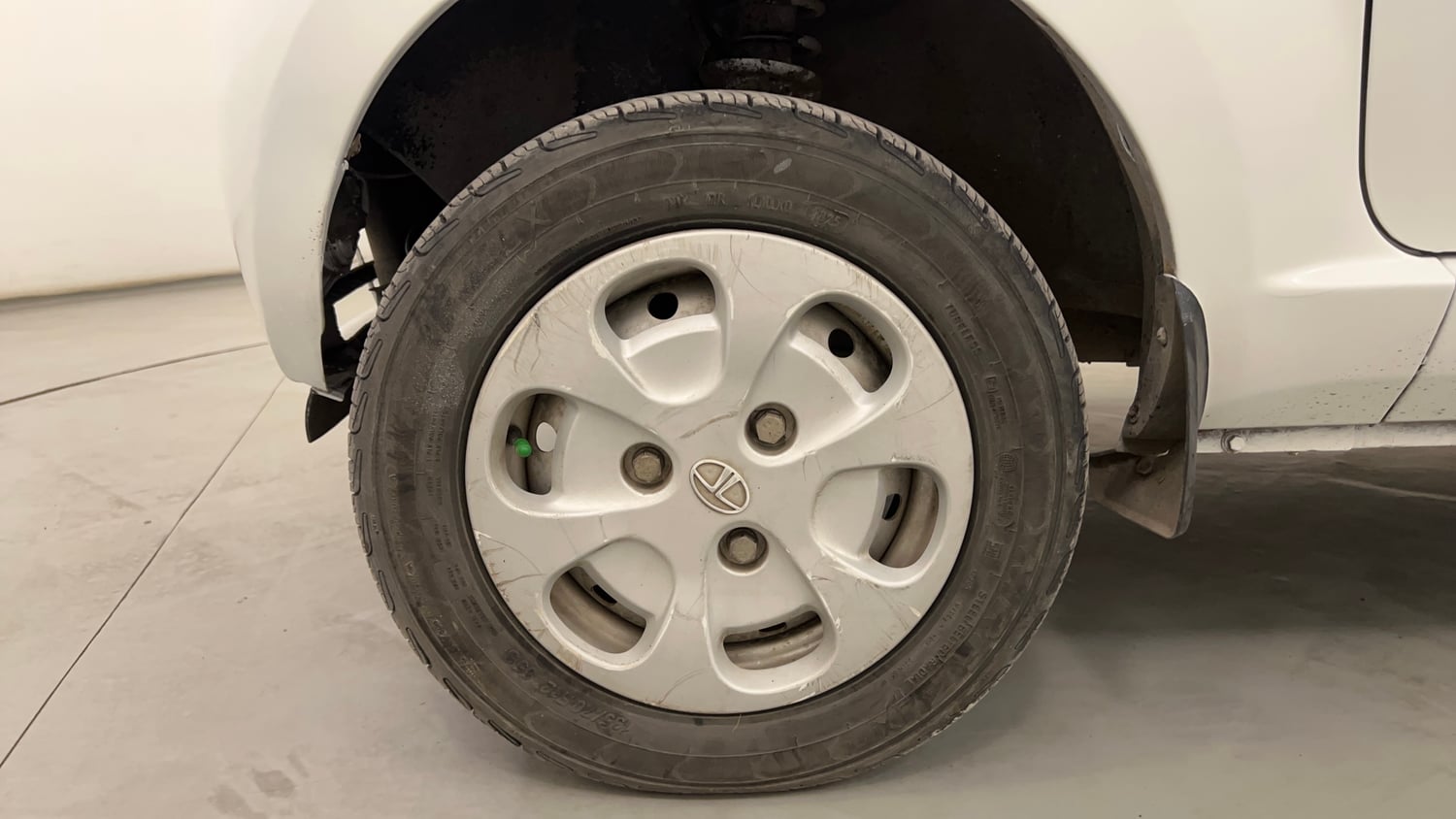 Used 2015 Tata Nano Twist XT Petrol Manual tyres LEFT FRONT TYRE RIM VIEW