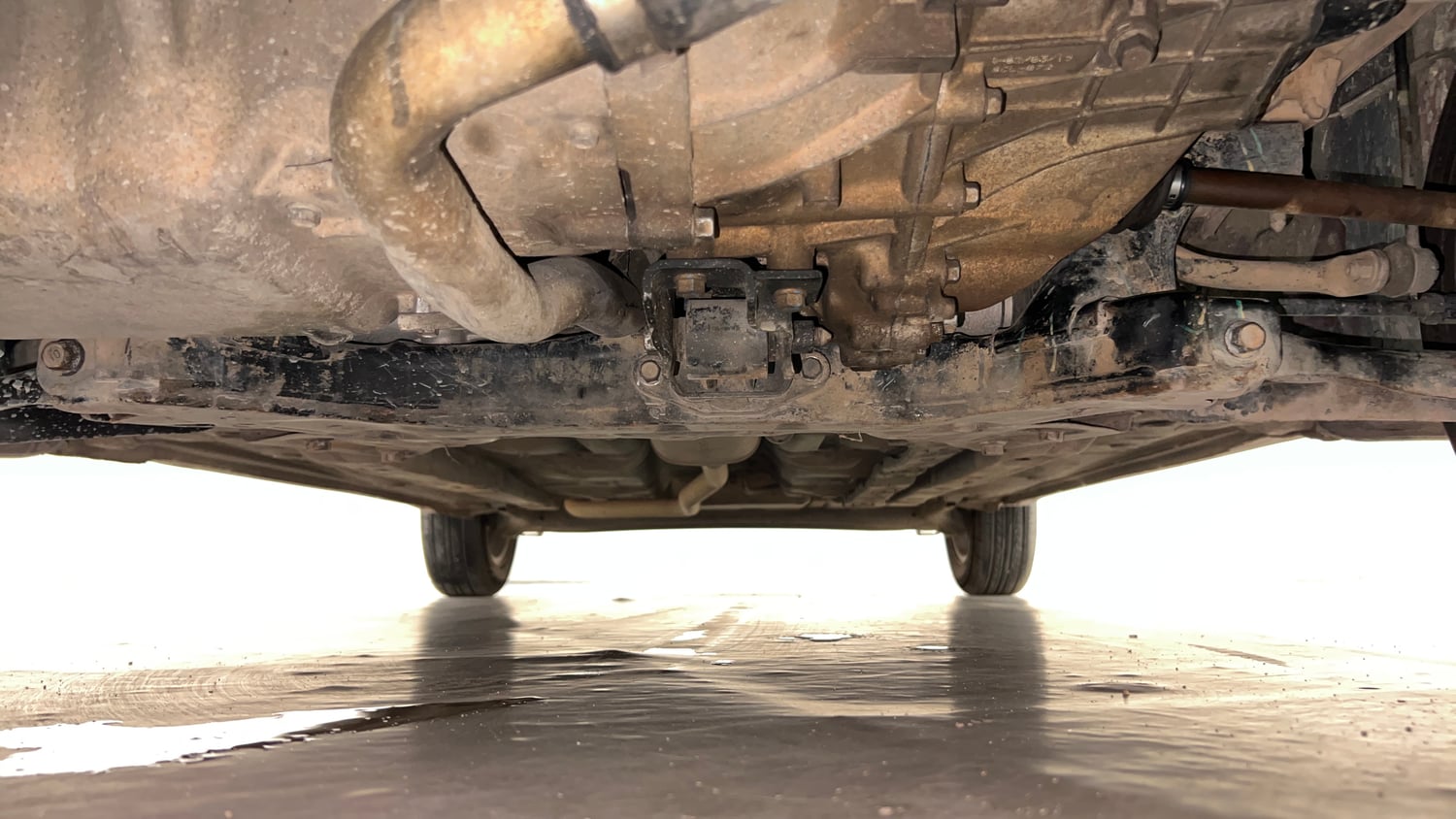 Used 2015 Hyundai Grand i10 Asta 1.1 CRDi (O) Diesel Manual extra FRONT LEFT UNDERBODY VIEW