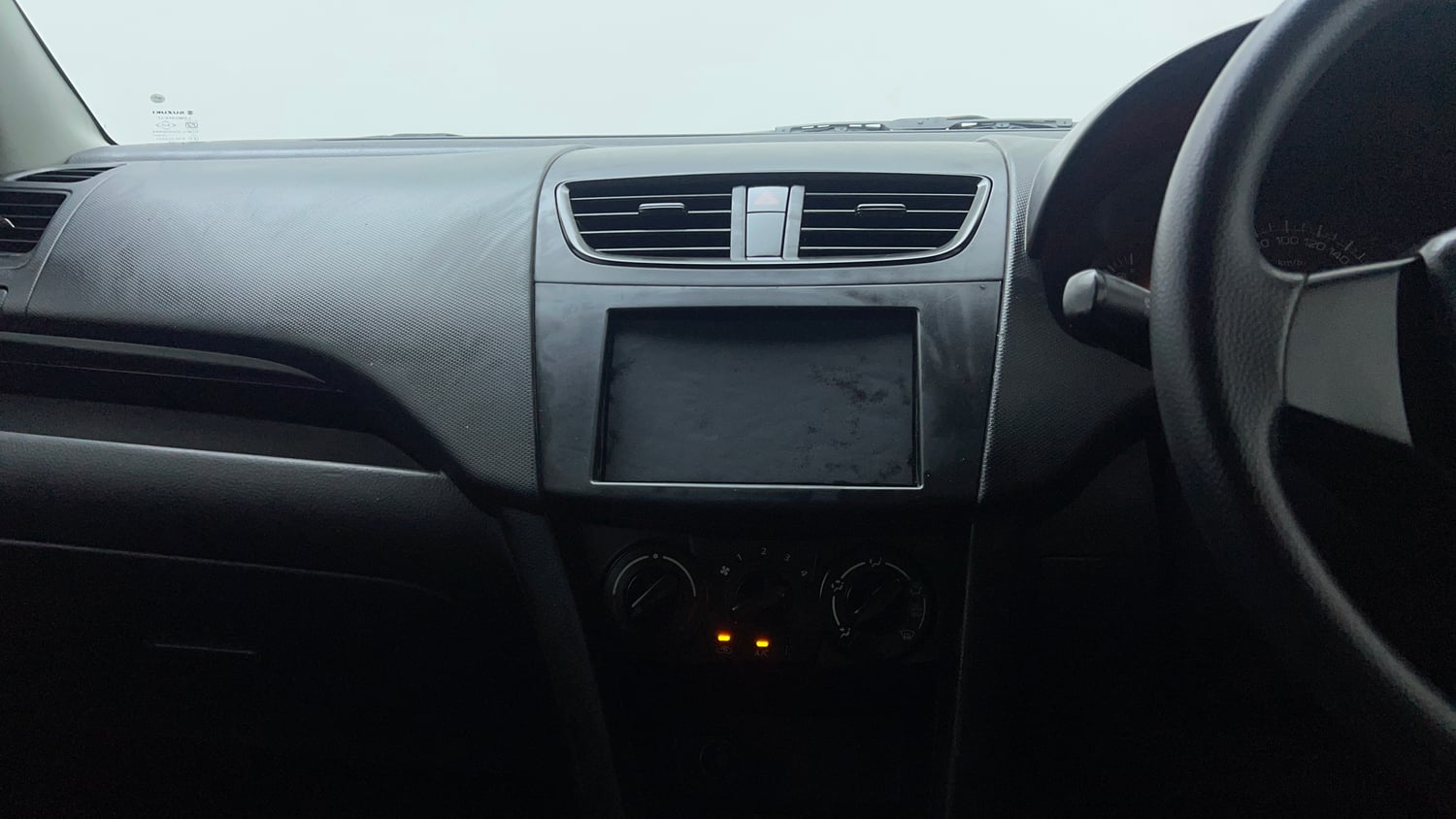 Used 2014 Maruti Suzuki Swift LXi Petrol Manual interior MUSIC SYSTEM & AC CONTROL VIEW