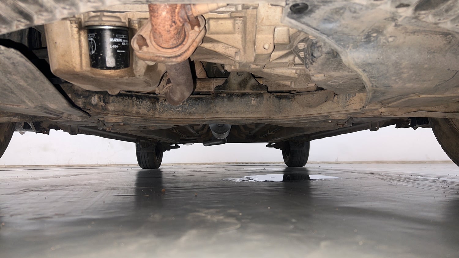 Used 2015 Maruti Suzuki Ciaz VXi+ AT Petrol Automatic extra FRONT LEFT UNDERBODY VIEW
