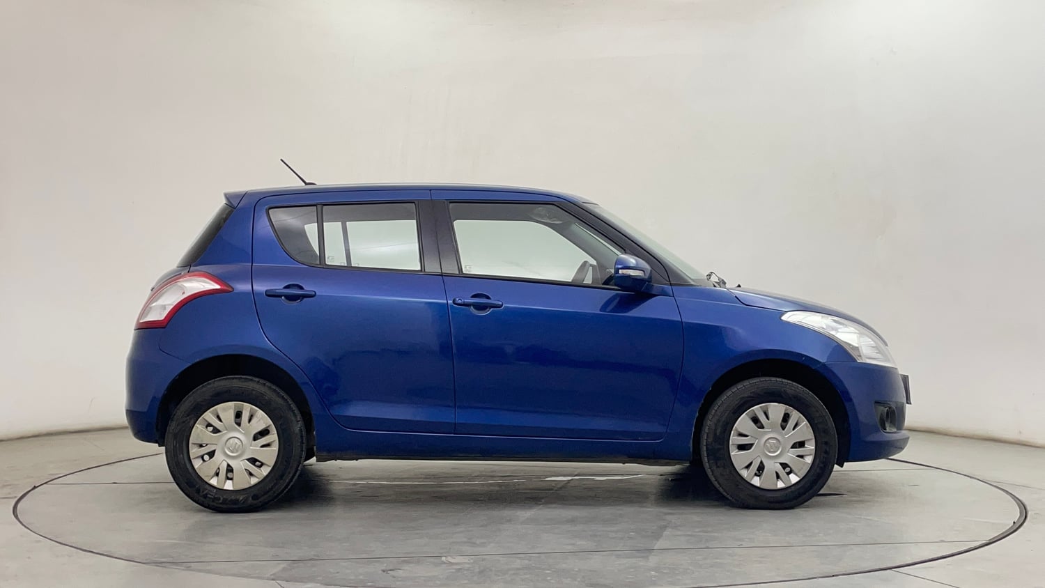 Used 2014 Maruti Suzuki Swift VXi Petrol Manual exterior RIGHT SIDE VIEW