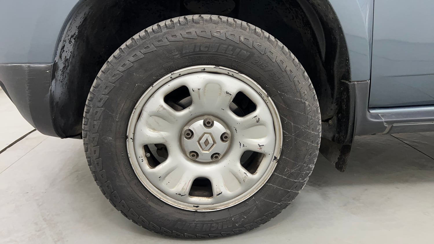 Used 2013 Renault Duster RxL Petrol Petrol Manual tyres LEFT FRONT TYRE RIM VIEW