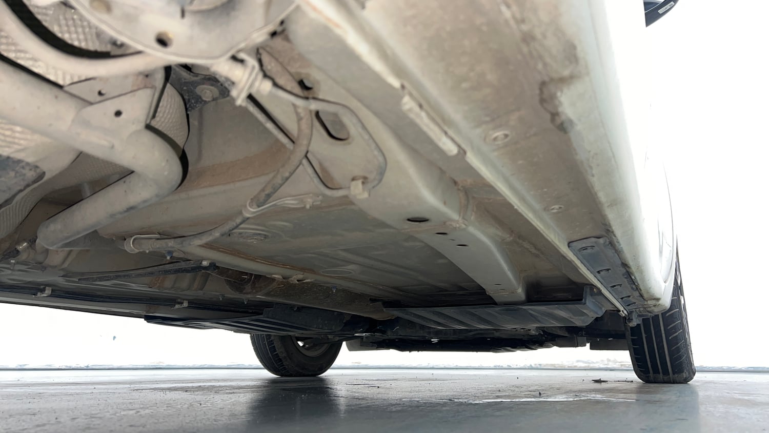 Used 2022 Maruti Suzuki Dzire VXi AGS Petrol Automatic extra REAR RIGHT UNDERBODY VIEW