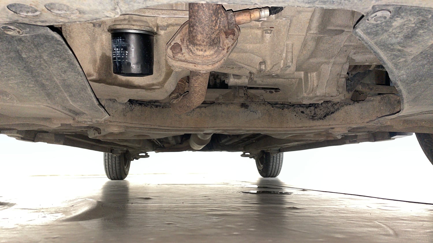 Used 2014 Maruti Suzuki Swift VXi Petrol Manual extra FRONT LEFT UNDERBODY VIEW