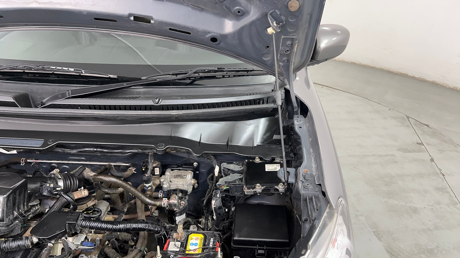 Used 2023 Maruti Suzuki Celerio VXi CNG Cng Manual engine ENGINE LEFT SIDE HINGE & APRON VIEW