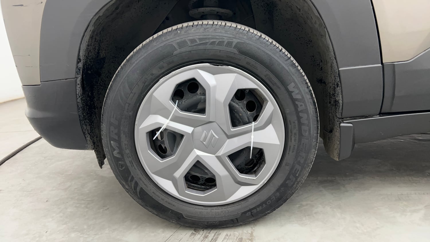 Used 2024 Maruti Suzuki Brezza LXi S-CNG Cng Manual tyres LEFT FRONT TYRE RIM VIEW