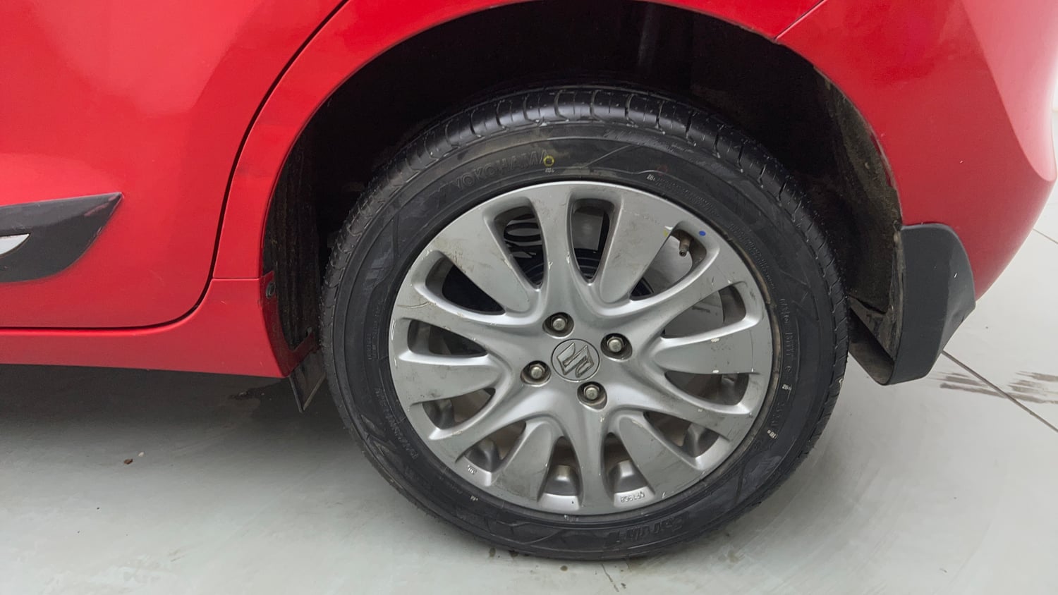 Used 2016 Maruti Suzuki Baleno Zeta 1.2 Petrol Manual tyres LEFT REAR TYRE RIM VIEW