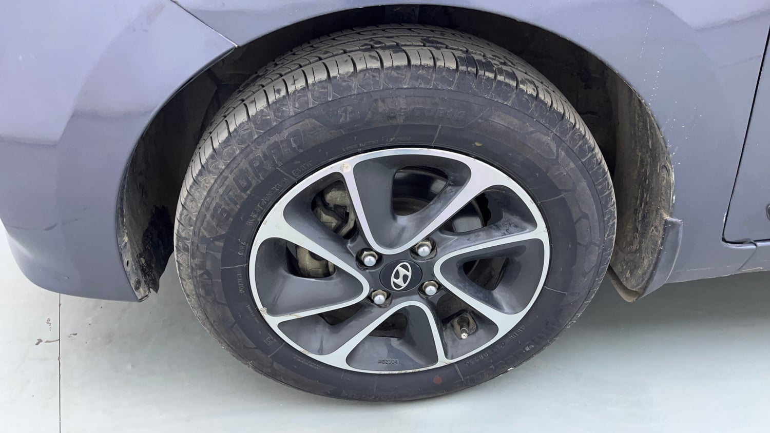Used 2018 Hyundai Grand i10 Asta 1.2 Kappa VTVT Petrol Manual tyres LEFT FRONT TYRE RIM VIEW