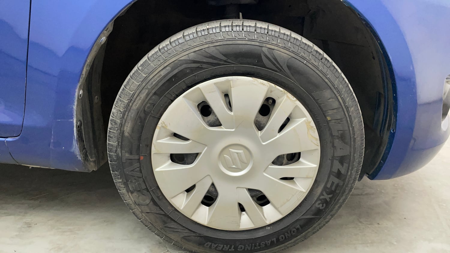 Used 2014 Maruti Suzuki Swift VXi Petrol Manual tyres RIGHT FRONT TYRE RIM VIEW
