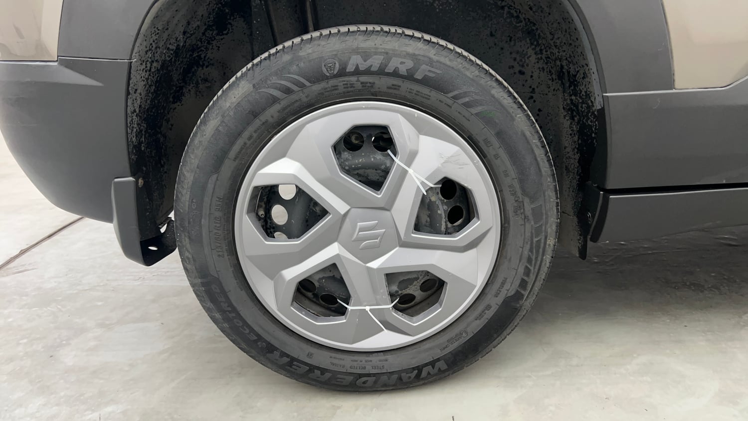 Used 2024 Maruti Suzuki Brezza LXi S-CNG Cng Manual tyres RIGHT REAR TYRE RIM VIEW