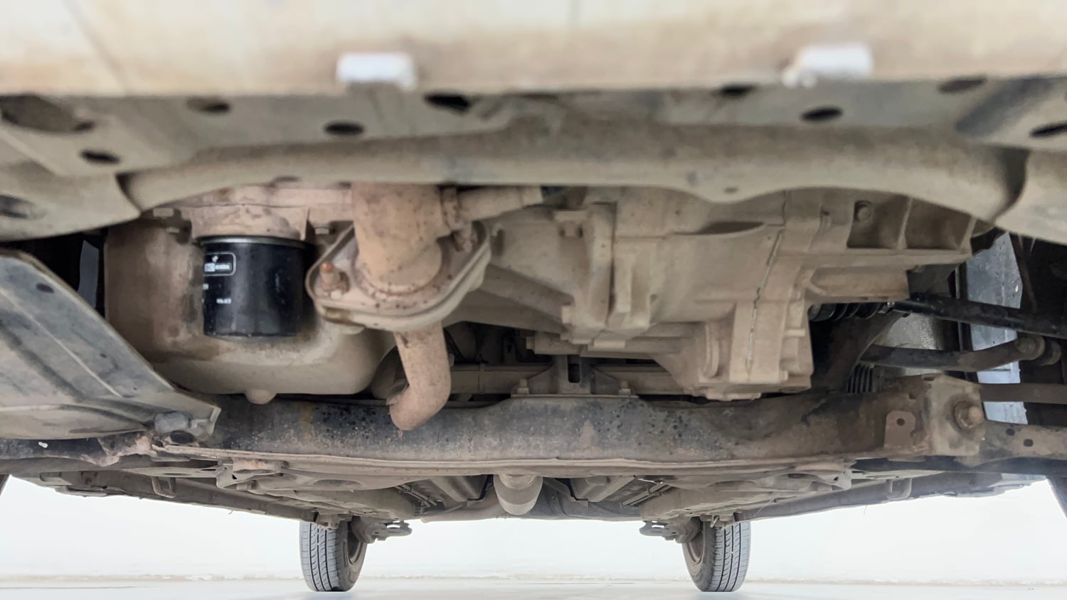 Used 2014 Maruti Suzuki Swift VXi Petrol Manual extra FRONT LEFT UNDERBODY VIEW