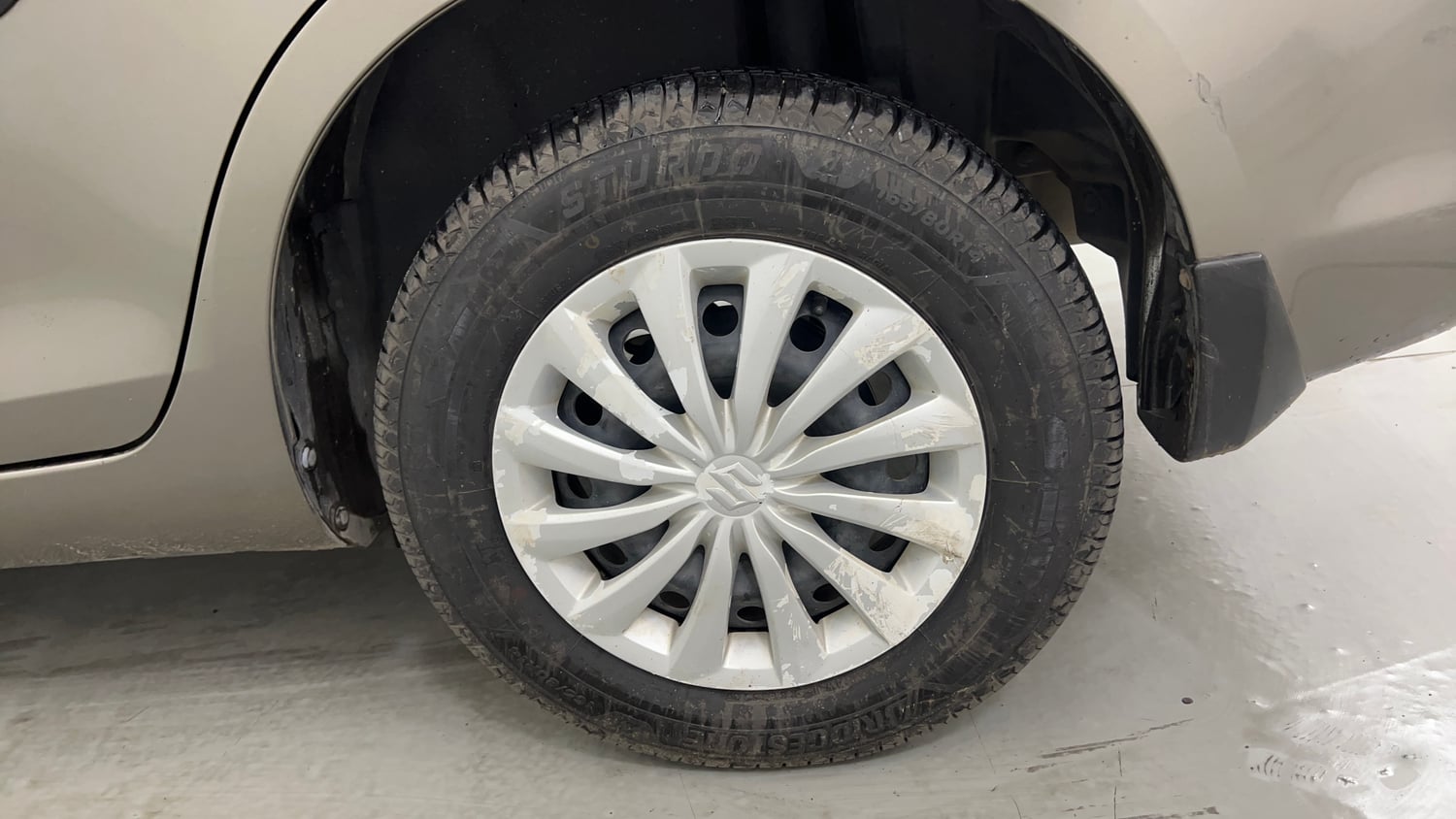 Used 2016 Maruti Suzuki Swift Dzire VXI Petrol Manual tyres LEFT REAR TYRE RIM VIEW