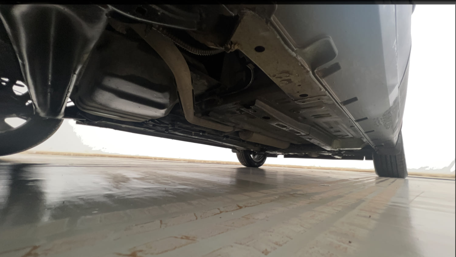 Used 2023 Tata Punch Creative Dual Tone AMT Petrol Automatic extra REAR RIGHT UNDERBODY VIEW