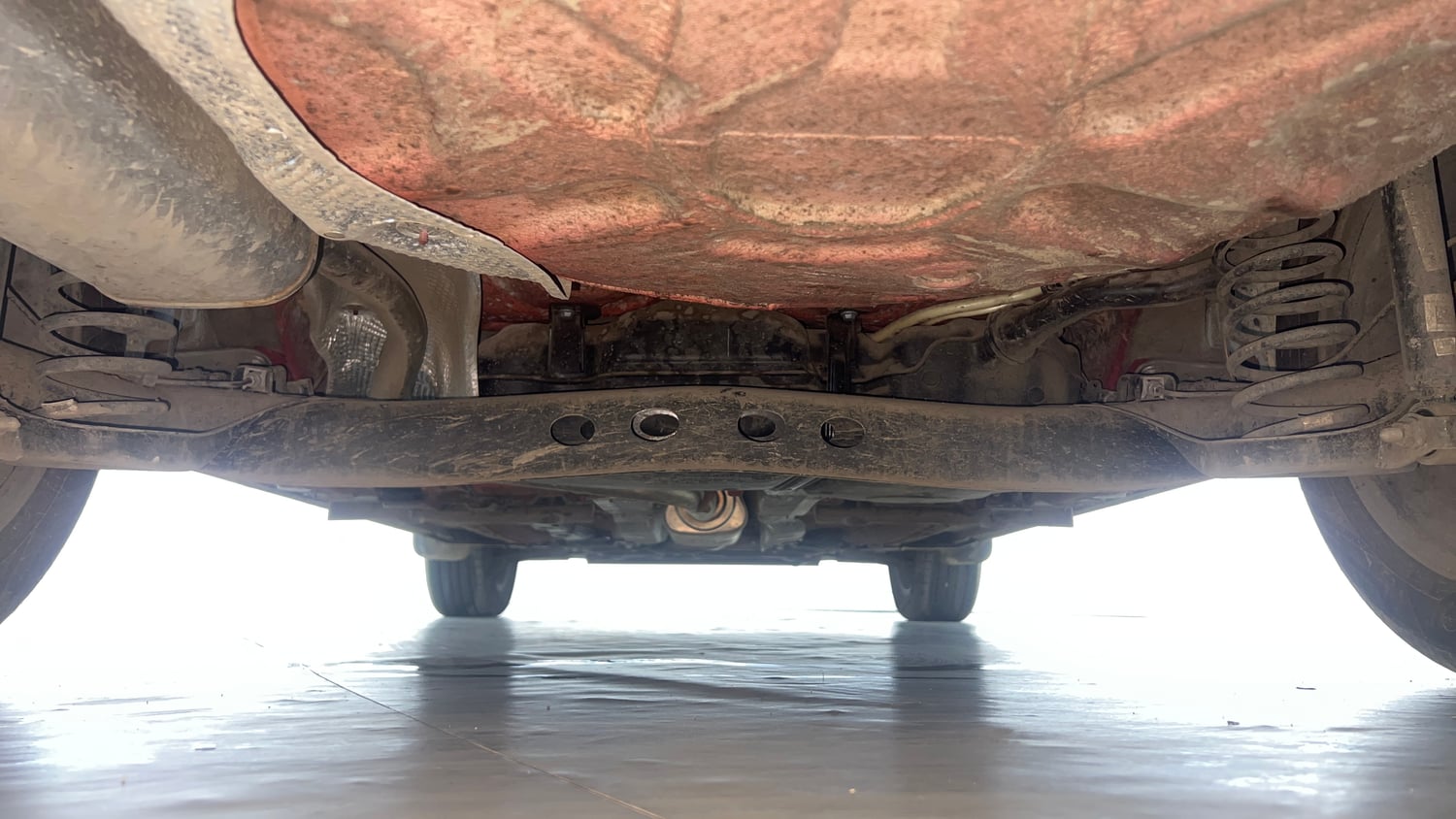 Used 2025 Skoda Slavia Style 1.0L TSI MT Petrol Manual extra REAR UNDERBODY VIEW (TAKEN FROM REAR)
