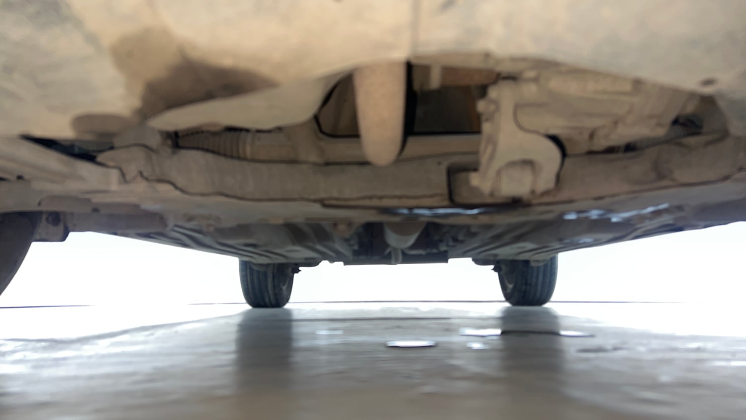 Used 2021 Maruti Suzuki Vitara Brezza ZXi AT SHVS Petrol Automatic extra FRONT LEFT UNDERBODY VIEW