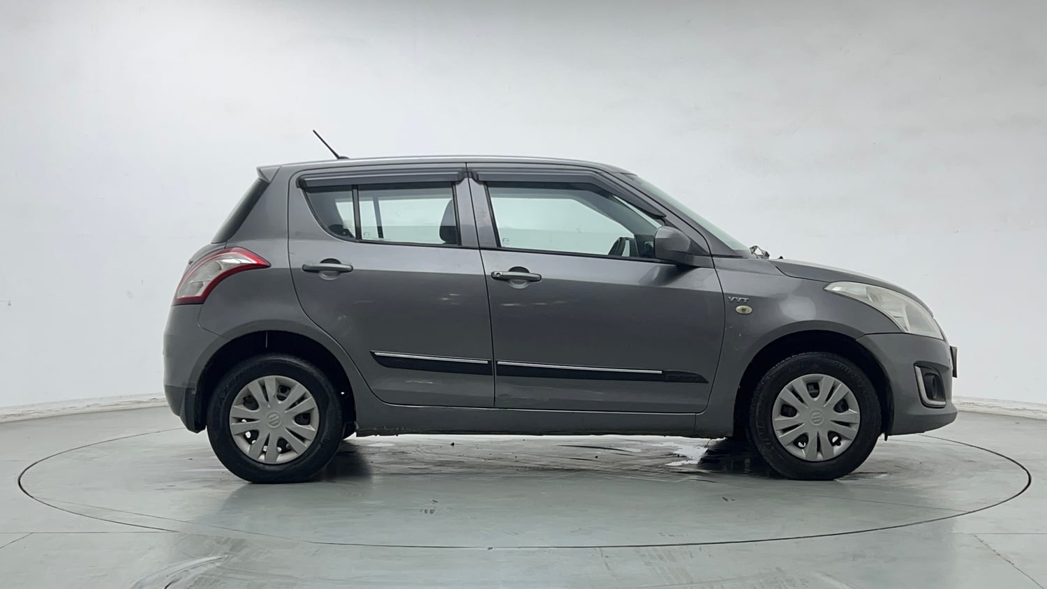 Used 2014 Maruti Suzuki Swift LXi Petrol Manual exterior RIGHT SIDE VIEW