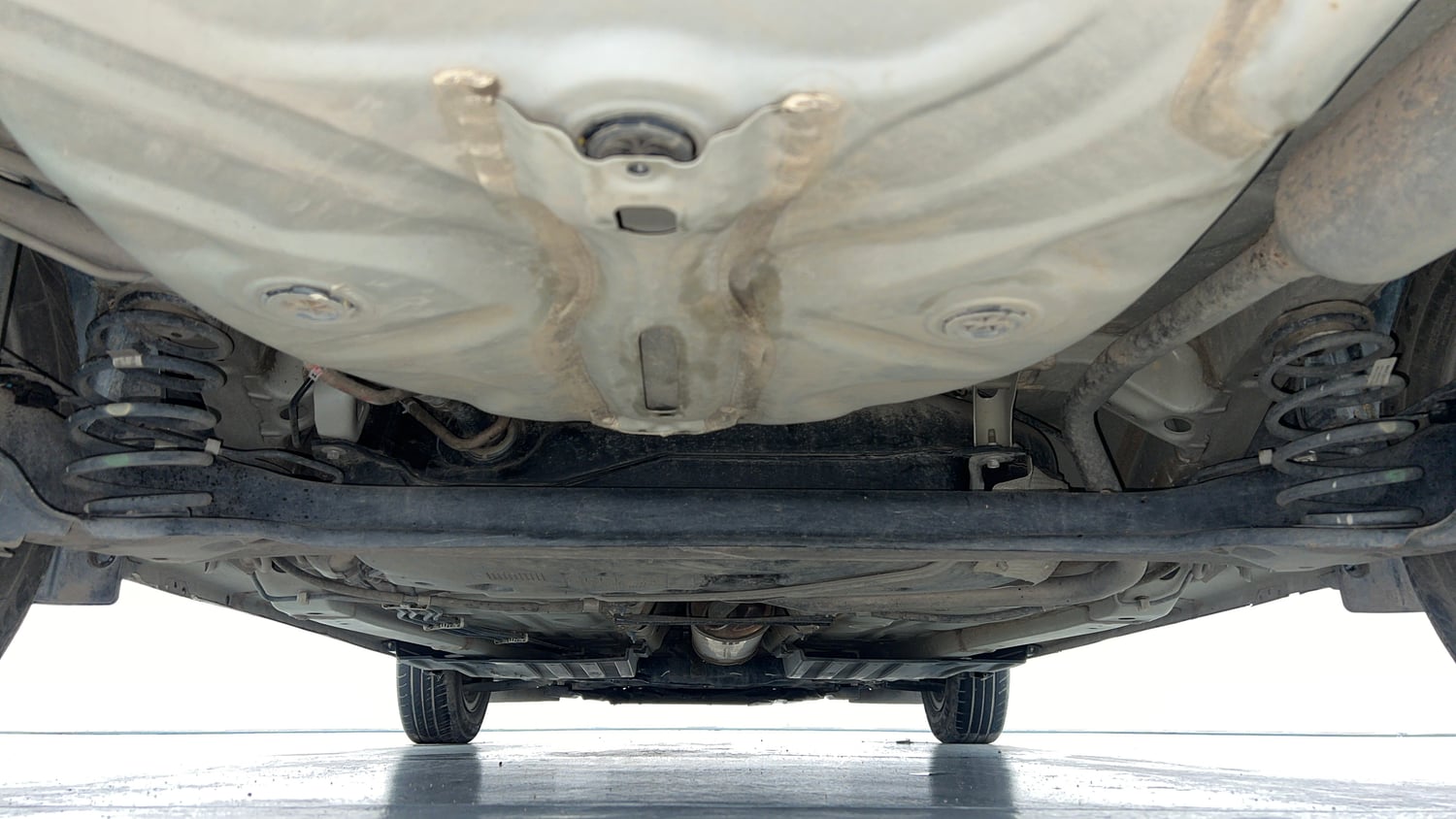 Used 2022 Maruti Suzuki Dzire VXi AGS Petrol Automatic extra REAR UNDERBODY VIEW (TAKEN FROM REAR)
