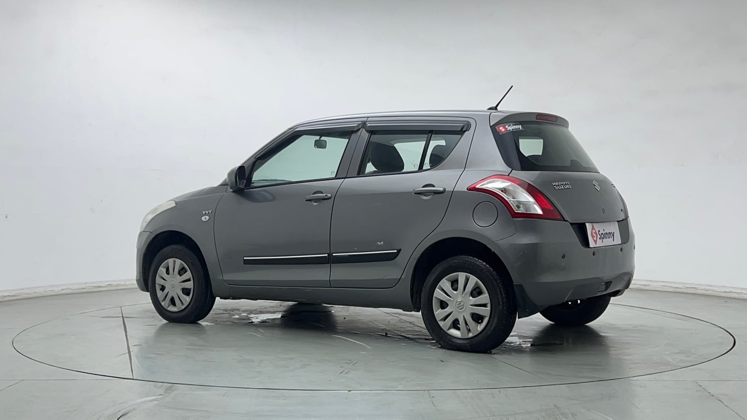 Used 2014 Maruti Suzuki Swift LXi Petrol Manual exterior LEFT REAR CORNER VIEW