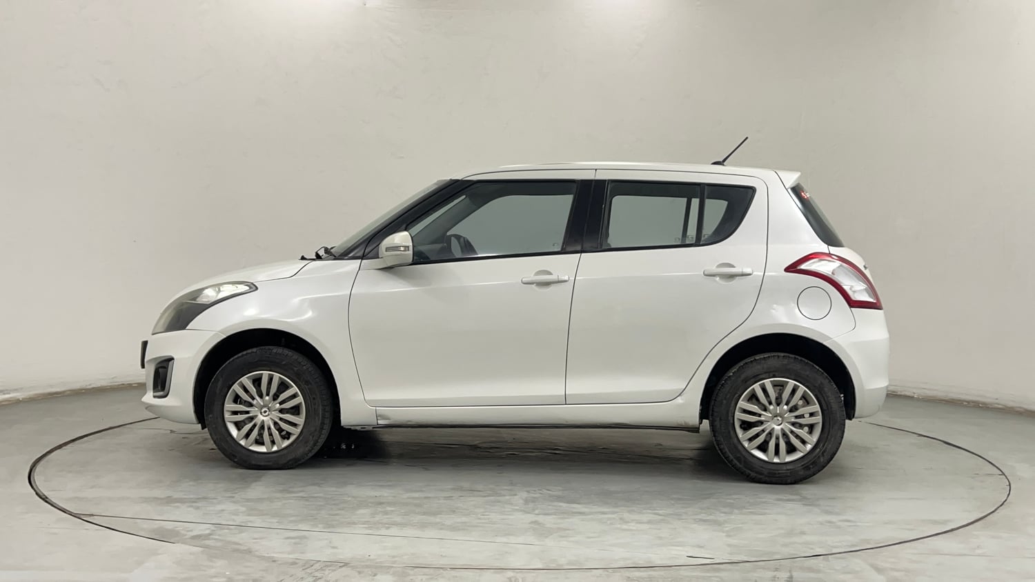 Used 2014 Maruti Suzuki Swift VXi Petrol Manual exterior LEFT SIDE VIEW